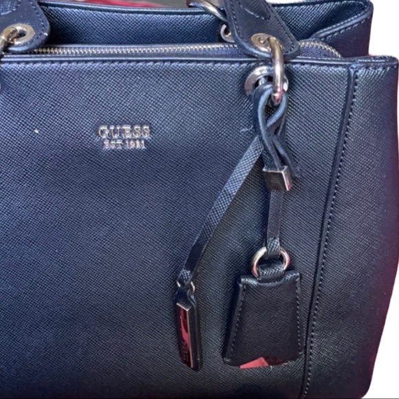 GUESS - Brand new Guess tote handbag in black. Multiple sections with pockets. - Picture 2 of 9